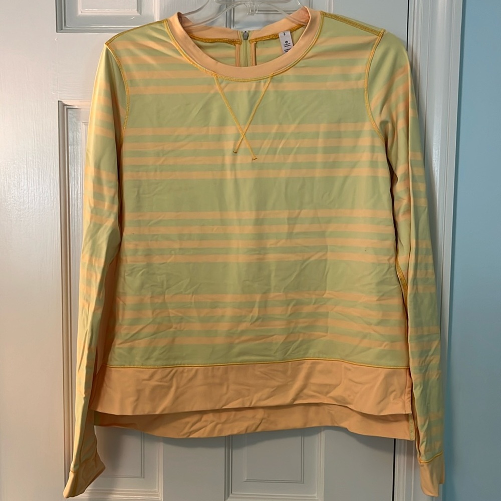 Lululemon nylon and spandex top.  Great for yoga topper , swim , riding , fun
